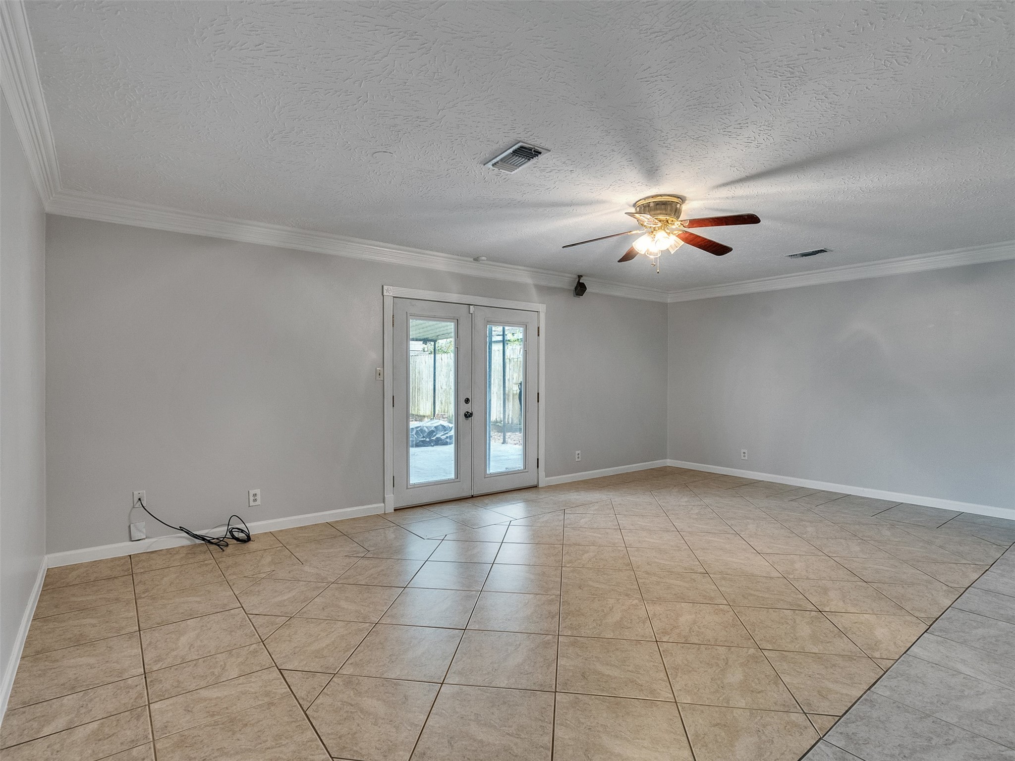 1630 Hollow Hook Road Houston, TX 77080 - Photo 5 of 22 a view of an empty room and chandelier fan