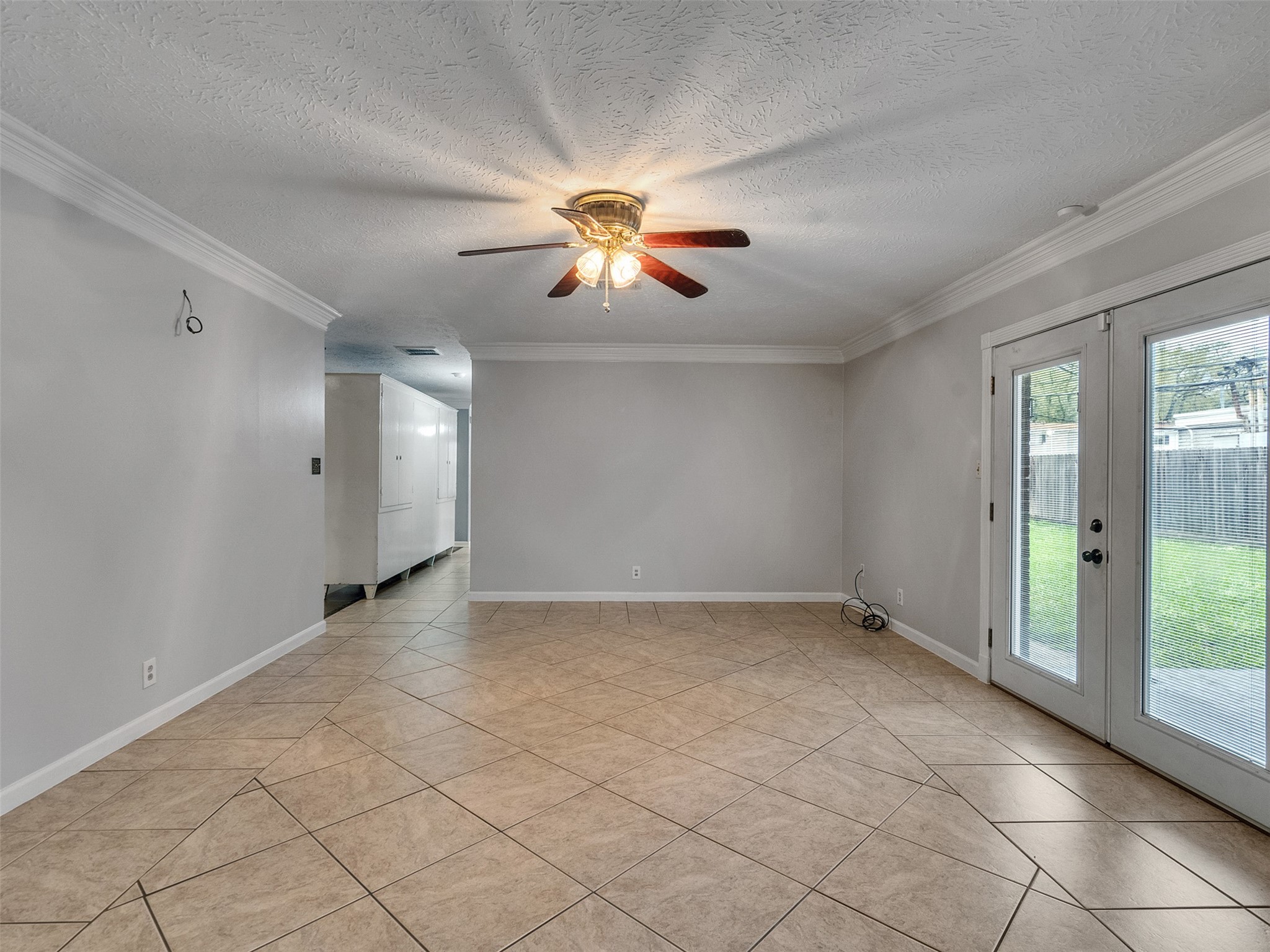 1630 Hollow Hook Road Houston, TX 77080 - Photo 6 of 22 wooden floor in an empty room with a window
