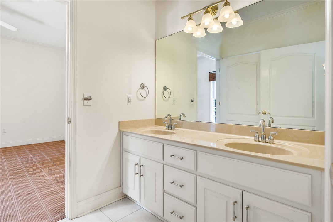 135 Sunset Bay Boulevard Seneca, SC 29672 - Photo 32 of 50 A double vanity with a large mirror provides ample space for daily routines.