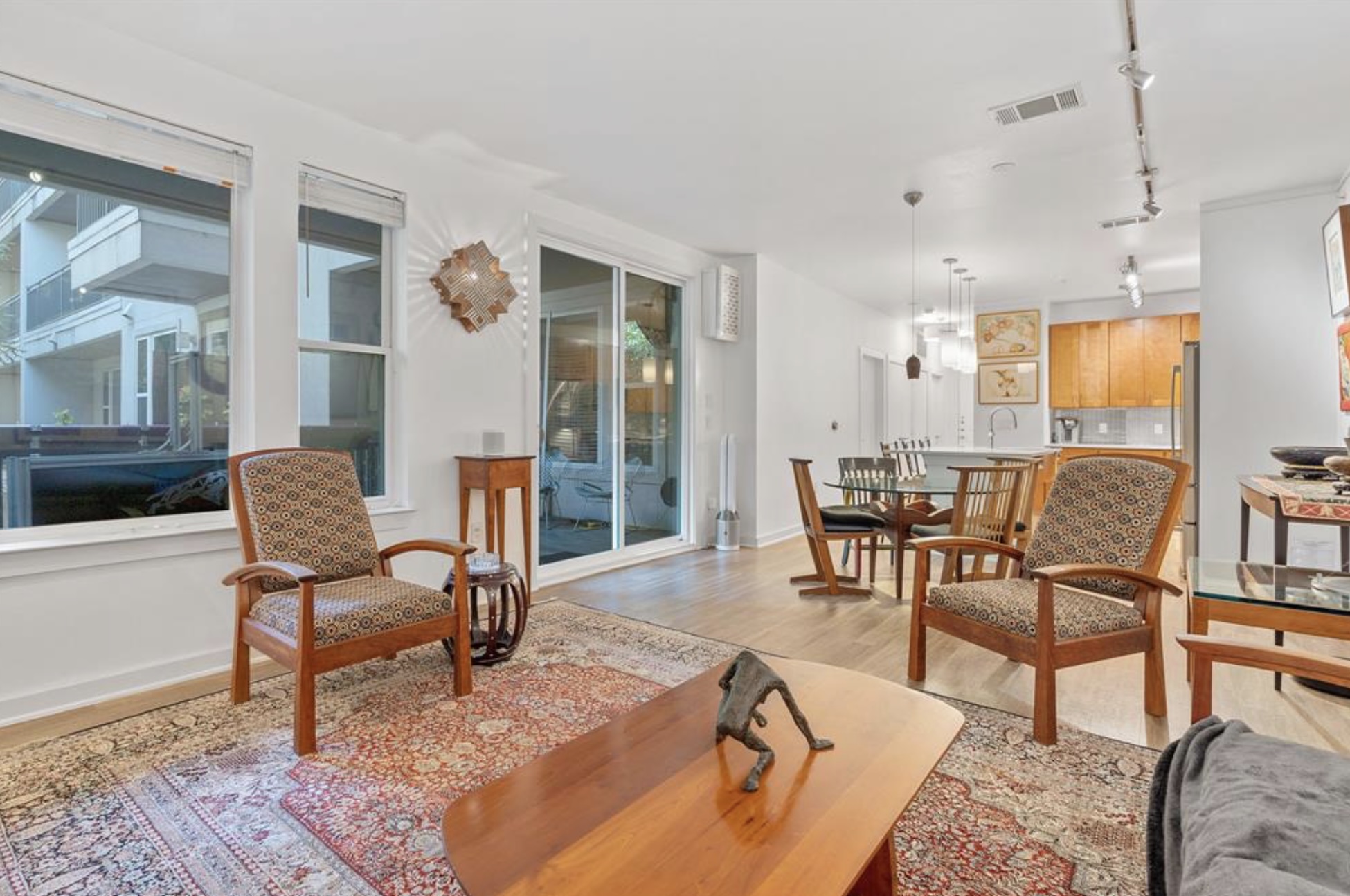 1900 Barton Springs Road, Unit 3031 Austin, TX 78704 - Photo 14 of 37 a living room with furniture and a large window