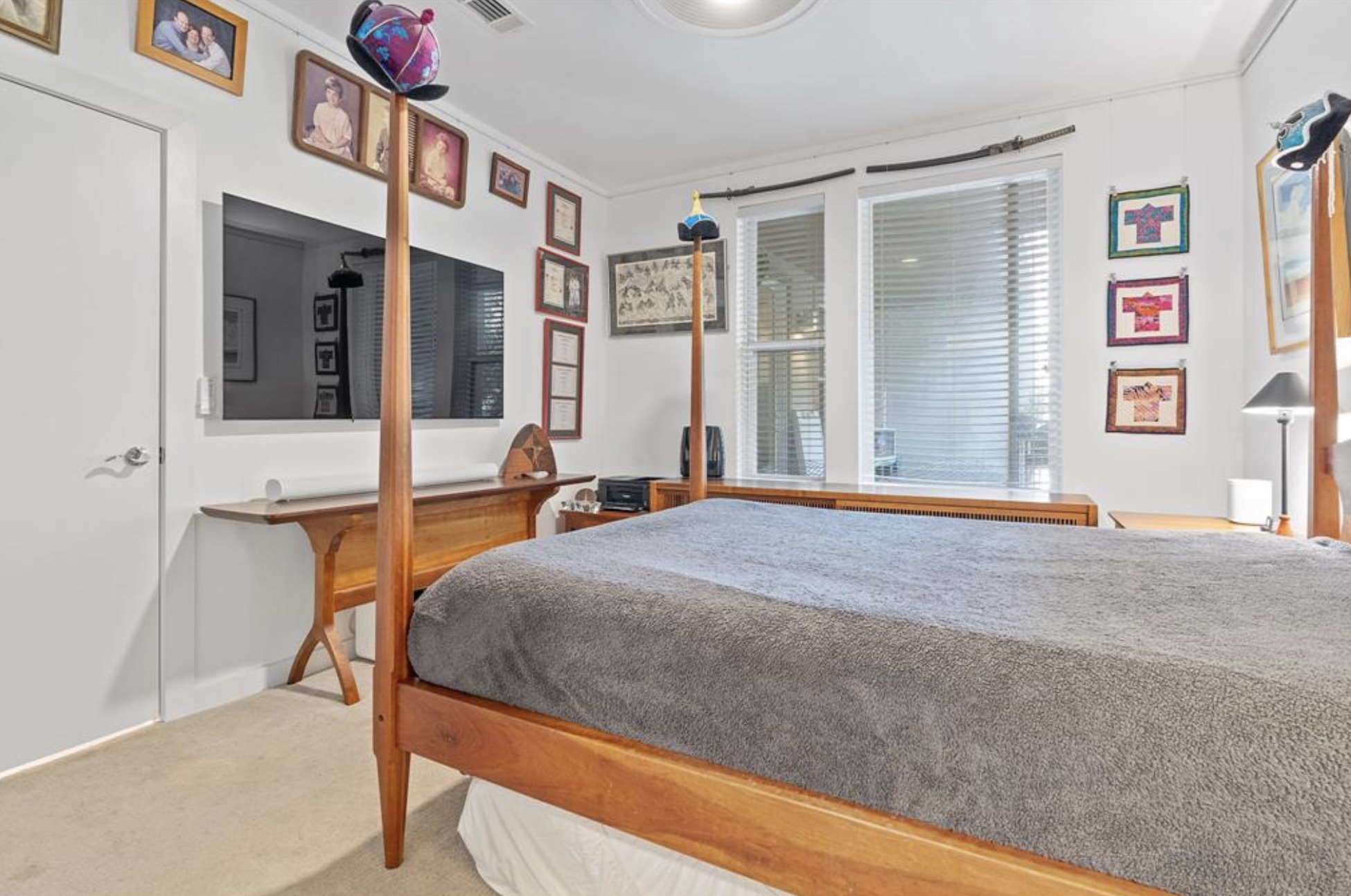 1900 Barton Springs Road, Unit 3031 Austin, TX 78704 - Photo 16 of 37 a bedroom with furniture and window