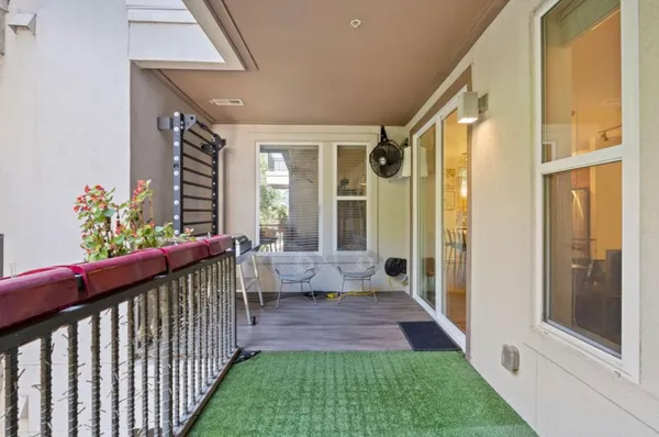a view of a porch with chairs