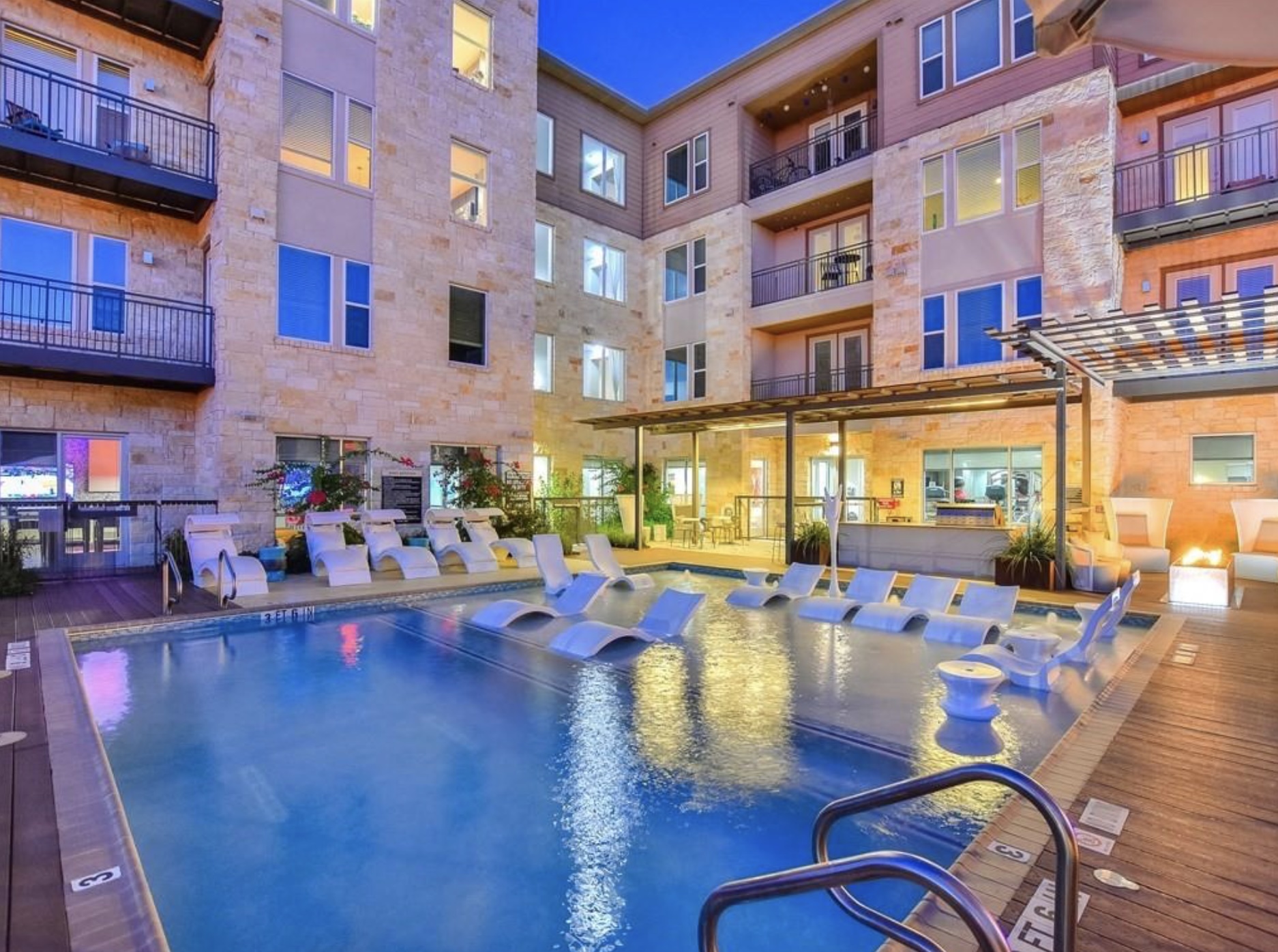 1900 Barton Springs Road, Unit 3031 Austin, TX 78704 - Photo 31 of 37 a front view of a building with outdoor seating