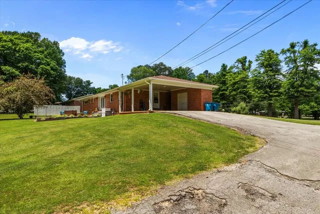 a view of a house with a big yard