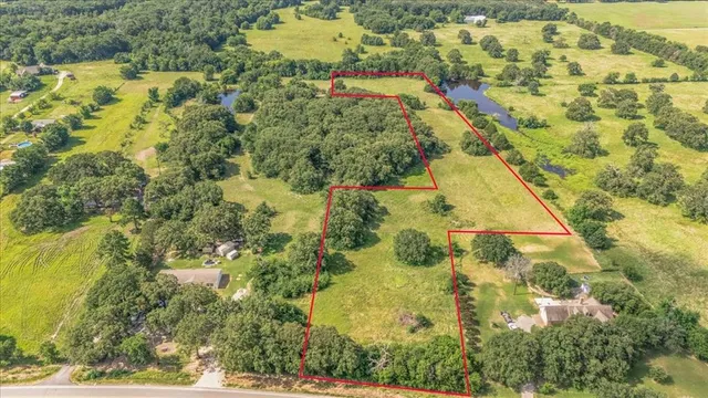 a view of residential houses with swimming pool