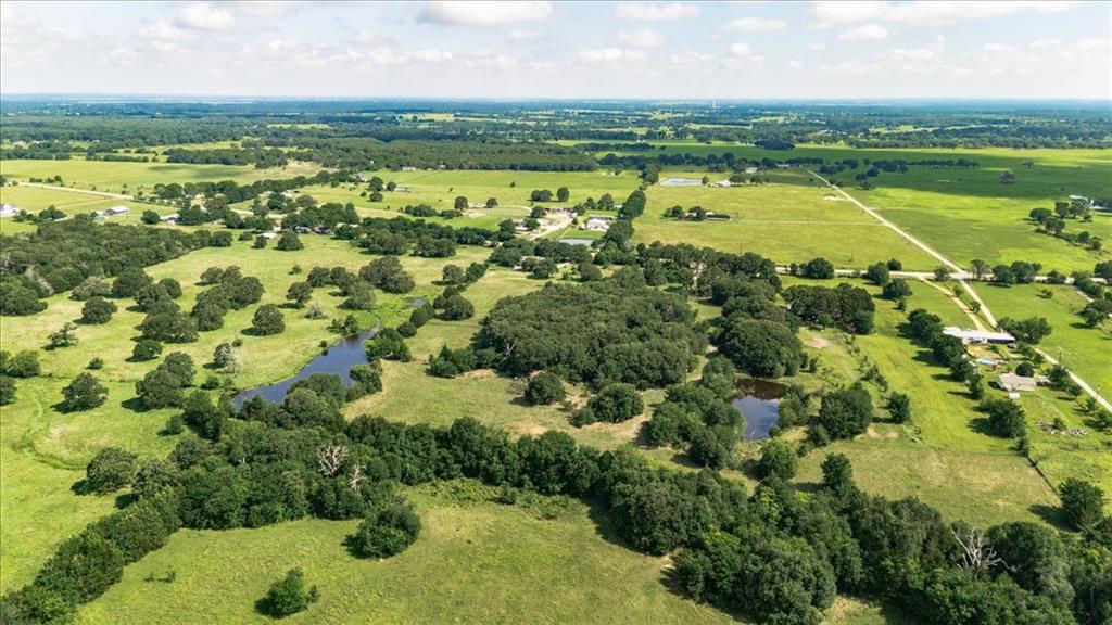 Part) Lot 4 Fm 2451 Scurry, TX 75158 - Photo 2 of 11 a view of a city with an ocean beach