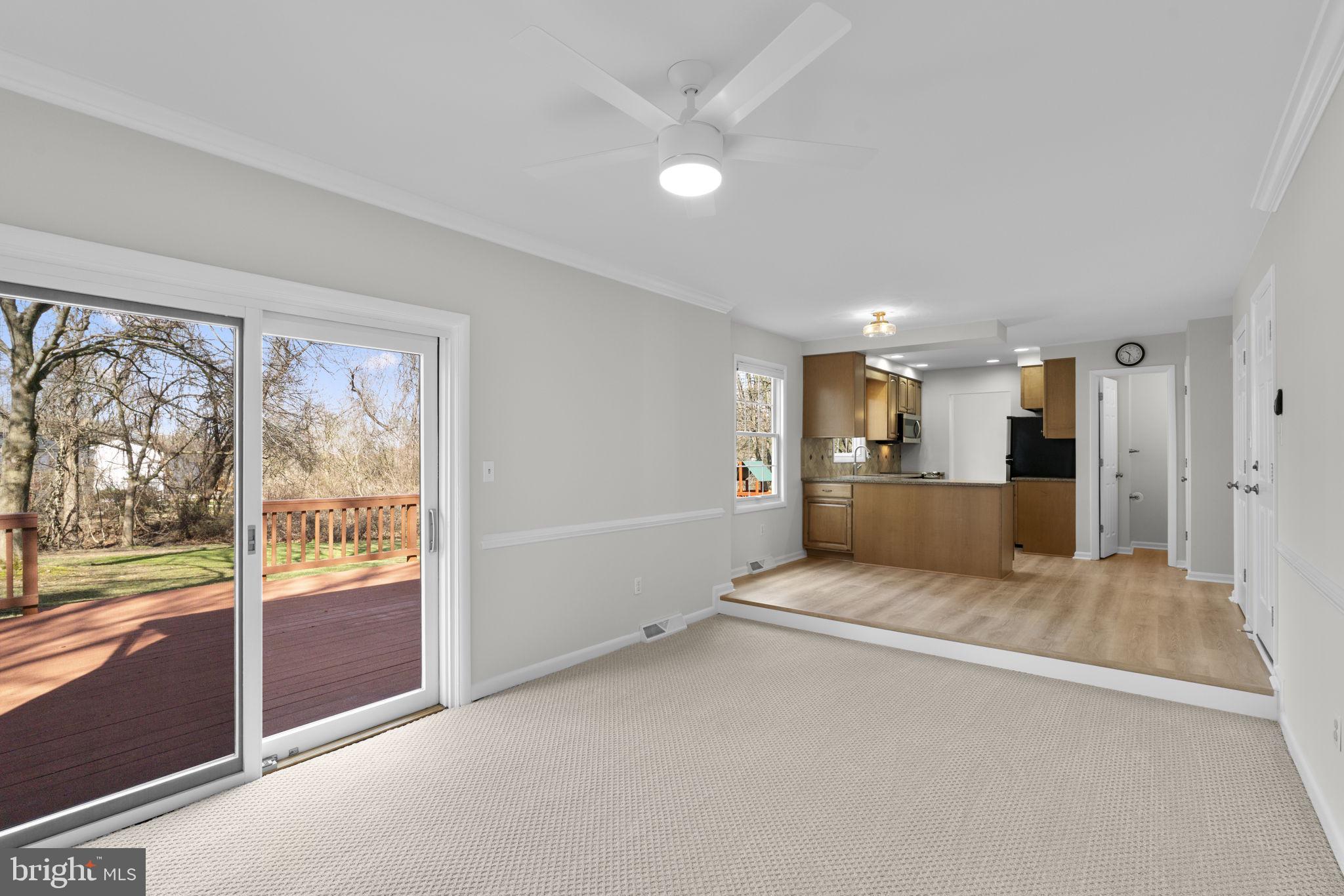 5461 Marsh Hawk Way Columbia, MD 21045 - Photo 18 of 48 a view of an empty room and a kitchen view