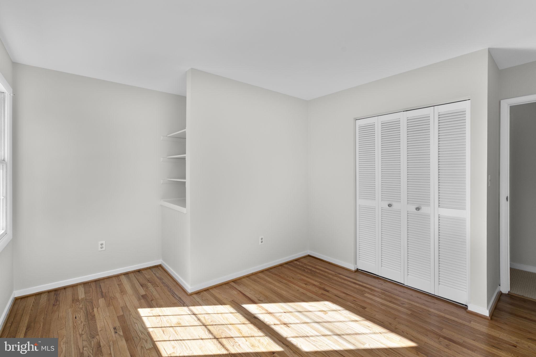 5461 Marsh Hawk Way Columbia, MD 21045 - Photo 24 of 48 a view of empty room with wooden floor