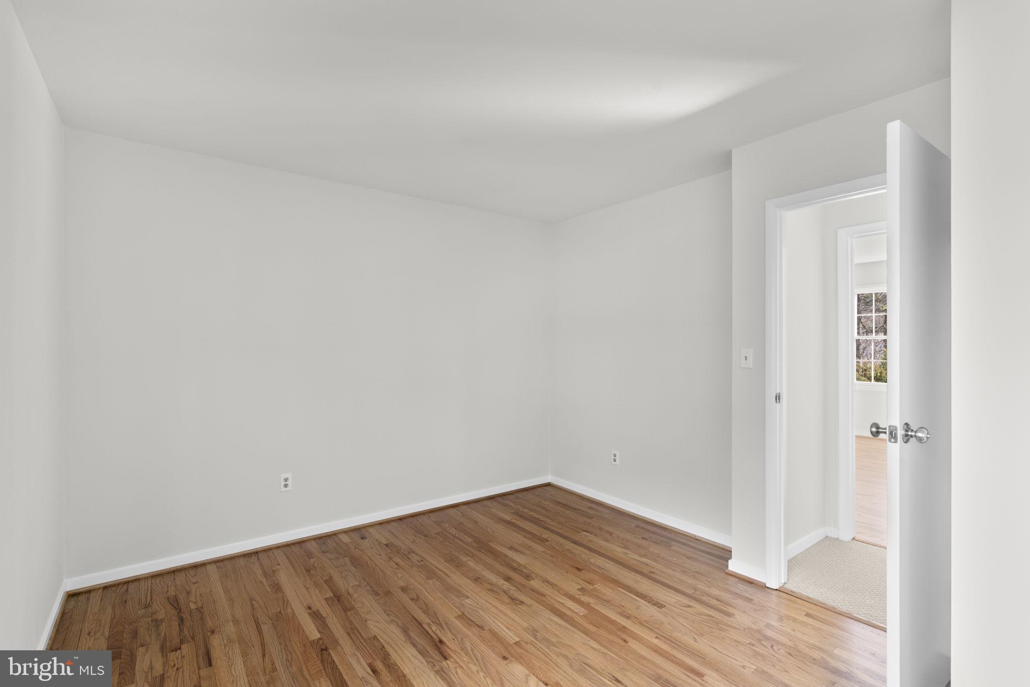 5461 Marsh Hawk Way Columbia, MD 21045 - Photo 30 of 48 a view of a room with wooden floor