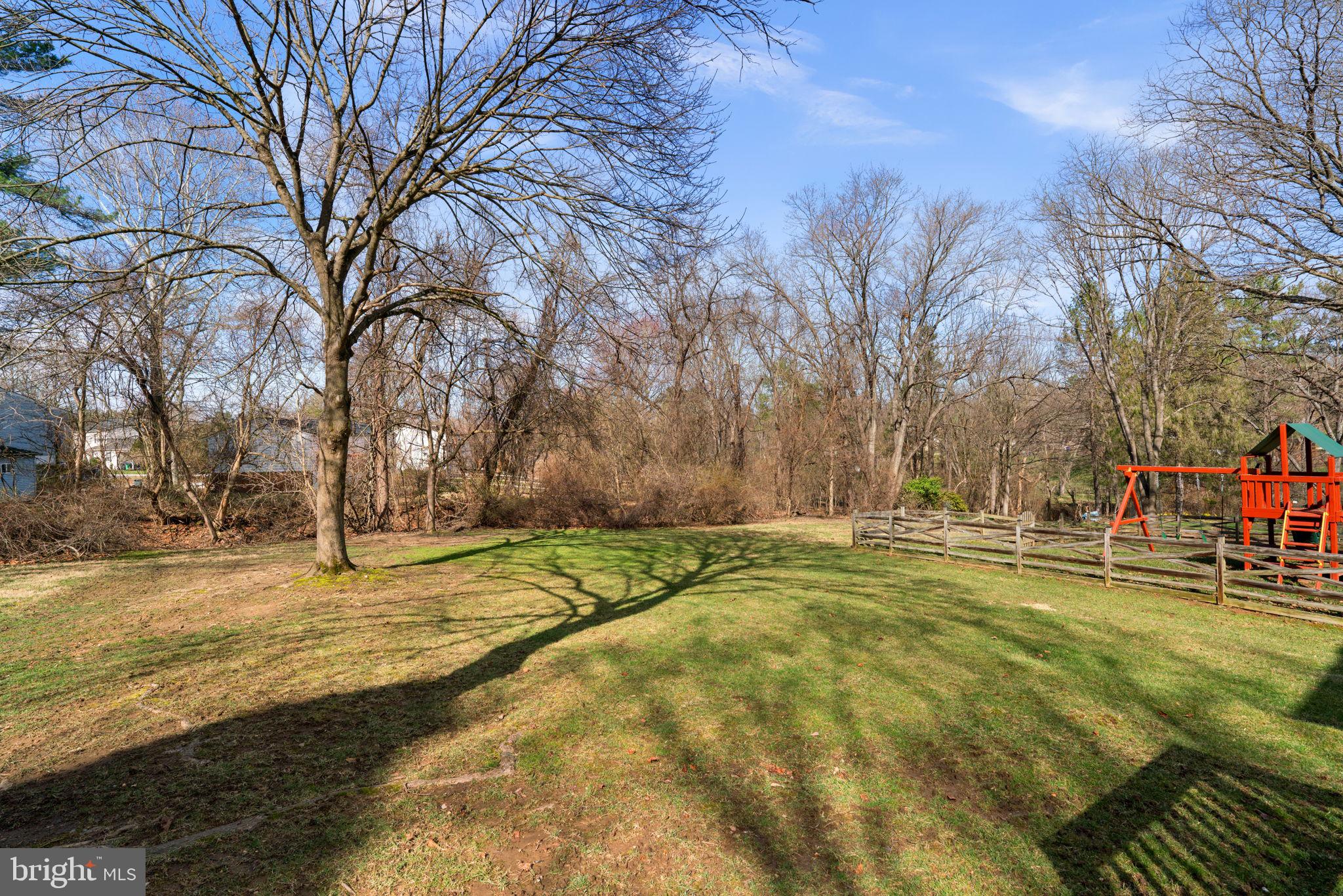 5461 Marsh Hawk Way Columbia, MD 21045 - Photo 43 of 48 a swimming pool with trees in the background