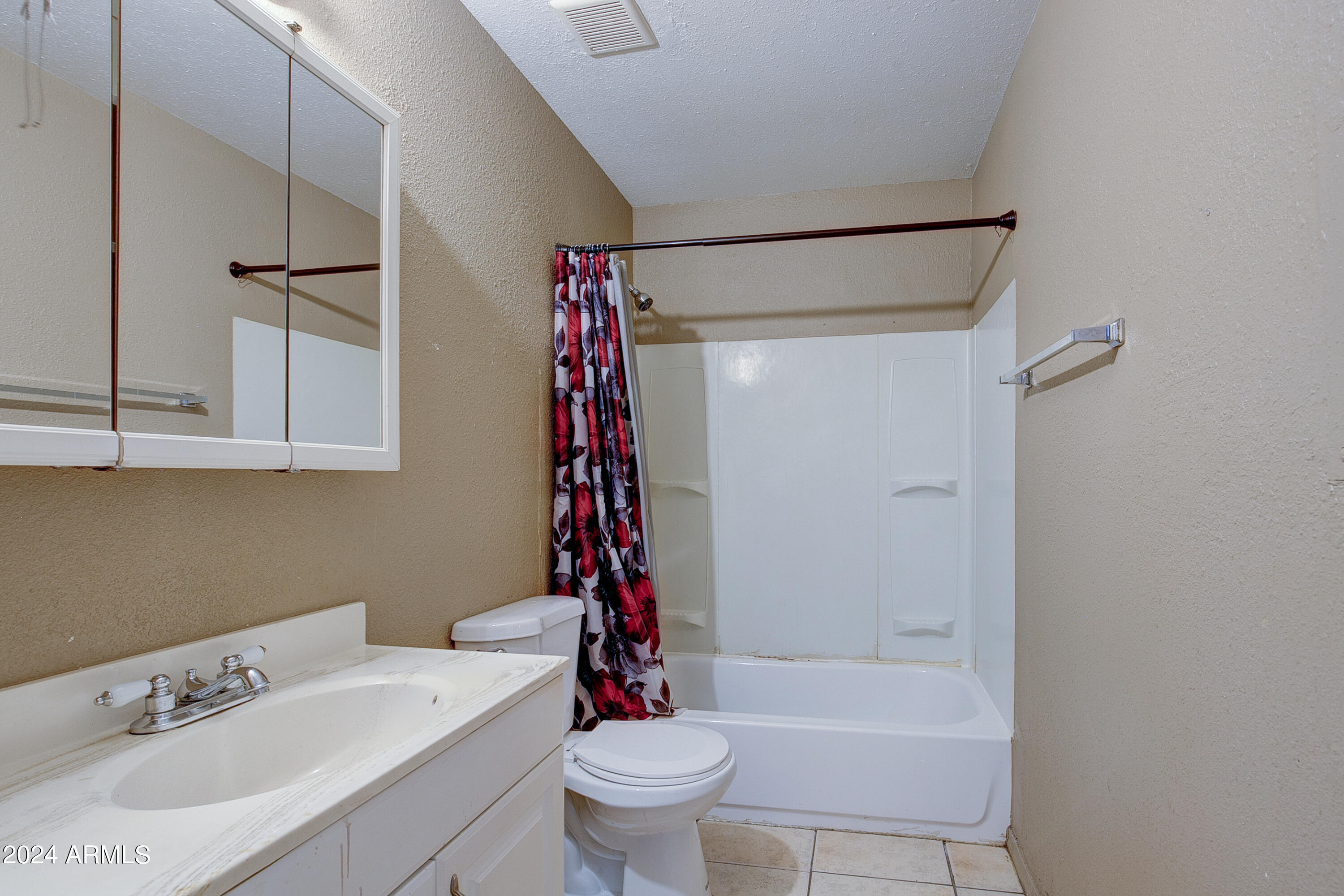9631 North 12th Avenue, Unit 201 Phoenix, AZ 85021 - Photo 14 of 32 a bathroom with a sink toilet and shower