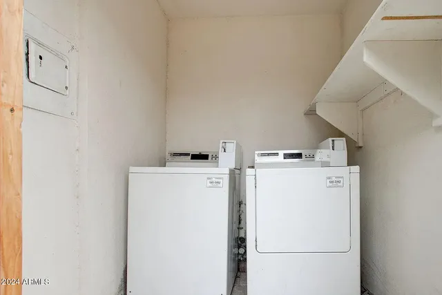 a utility room with dryer and washer