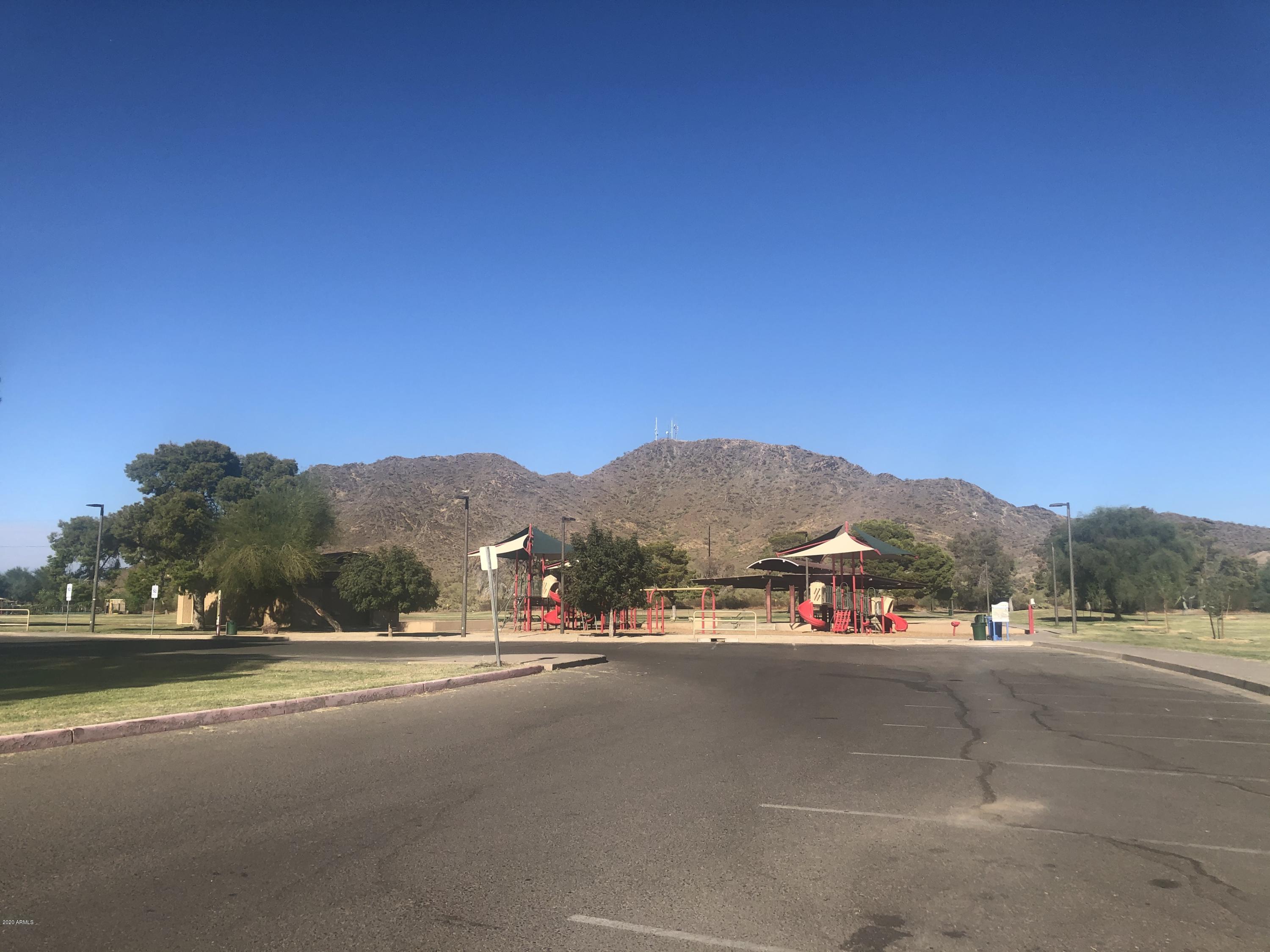 9631 North 12th Avenue, Unit 201 Phoenix, AZ 85021 - Photo 23 of 32 a view of street and houses with outdoor space