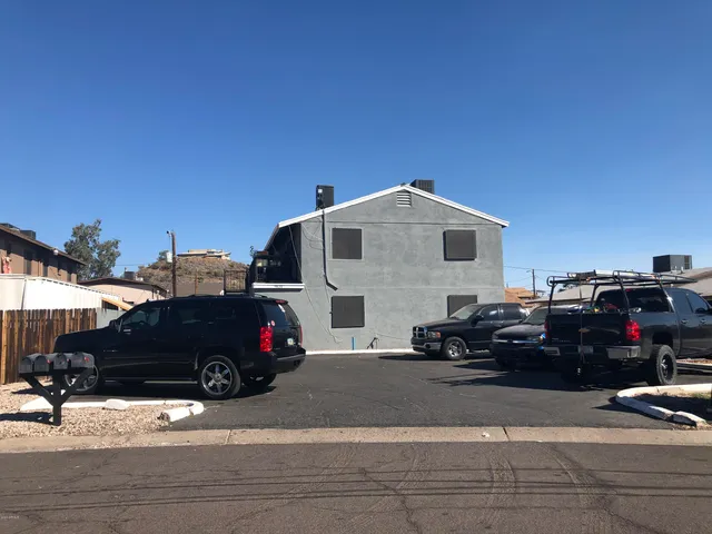 a view of a backyard of the house