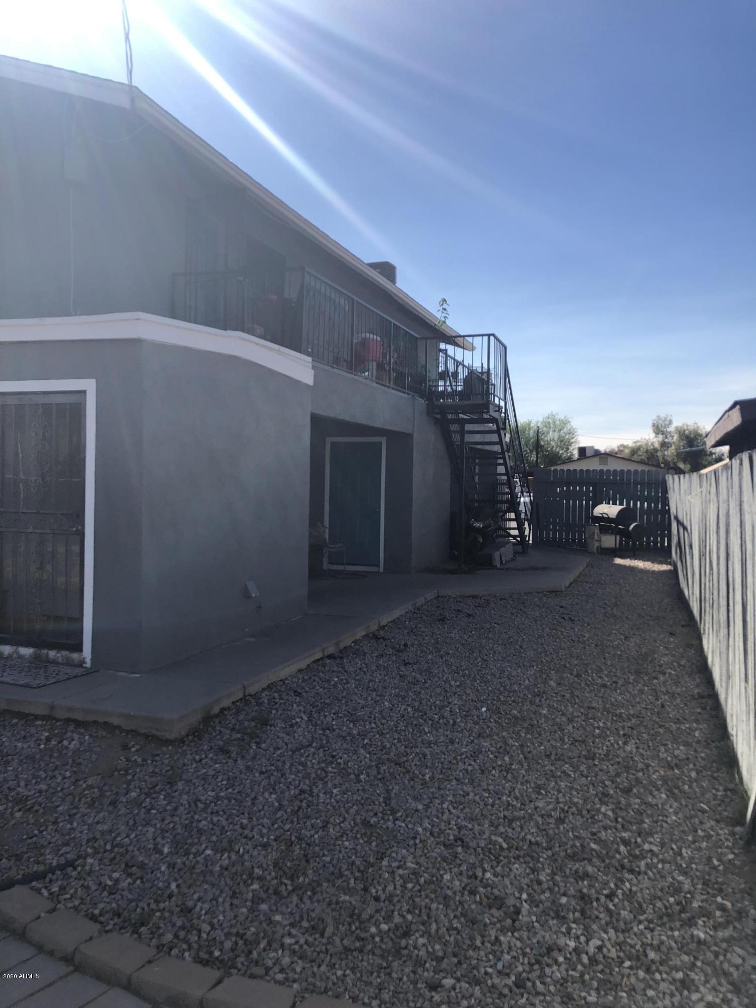 9631 North 12th Avenue, Unit 201 Phoenix, AZ 85021 - Photo 27 of 32 a view of a backyard of the house