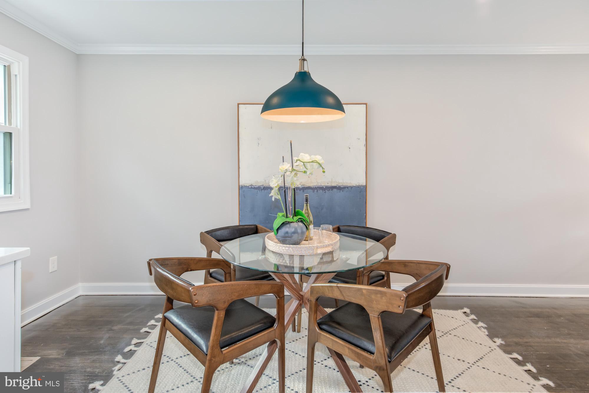 4003 Ames Street Northeast Washington, DC 20019 - Photo 16 of 44 Modern dining space with elegant decor.