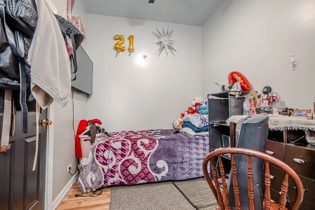 a view of a staircase with wooden floor and a window
