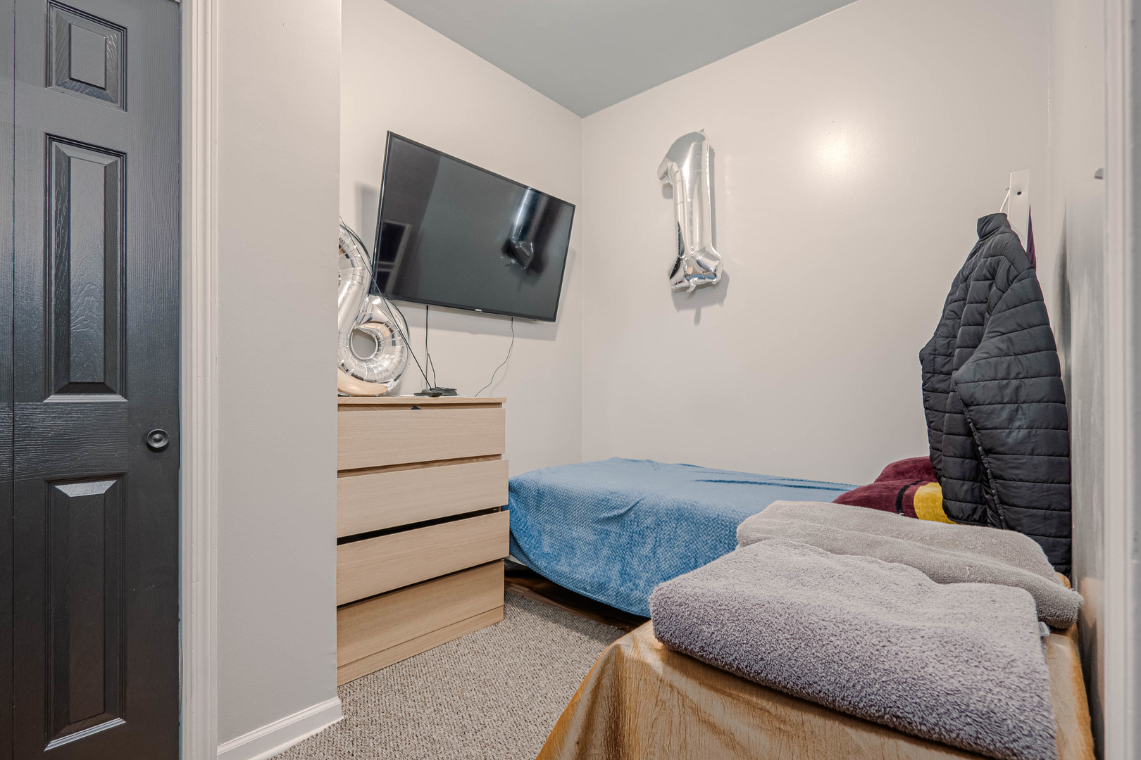 4910 West Walton Street Chicago, IL 60651 - Photo 10 of 27 a bedroom with two beds and painted walls