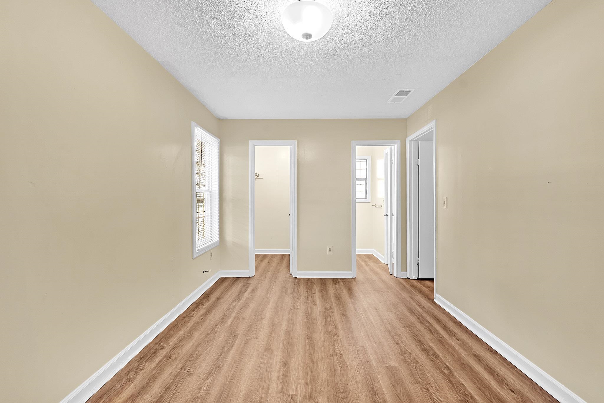 2955 Lake Park Road Memphis, TN 38127 - Photo 19 of 26 a view of a room with wooden floor and window