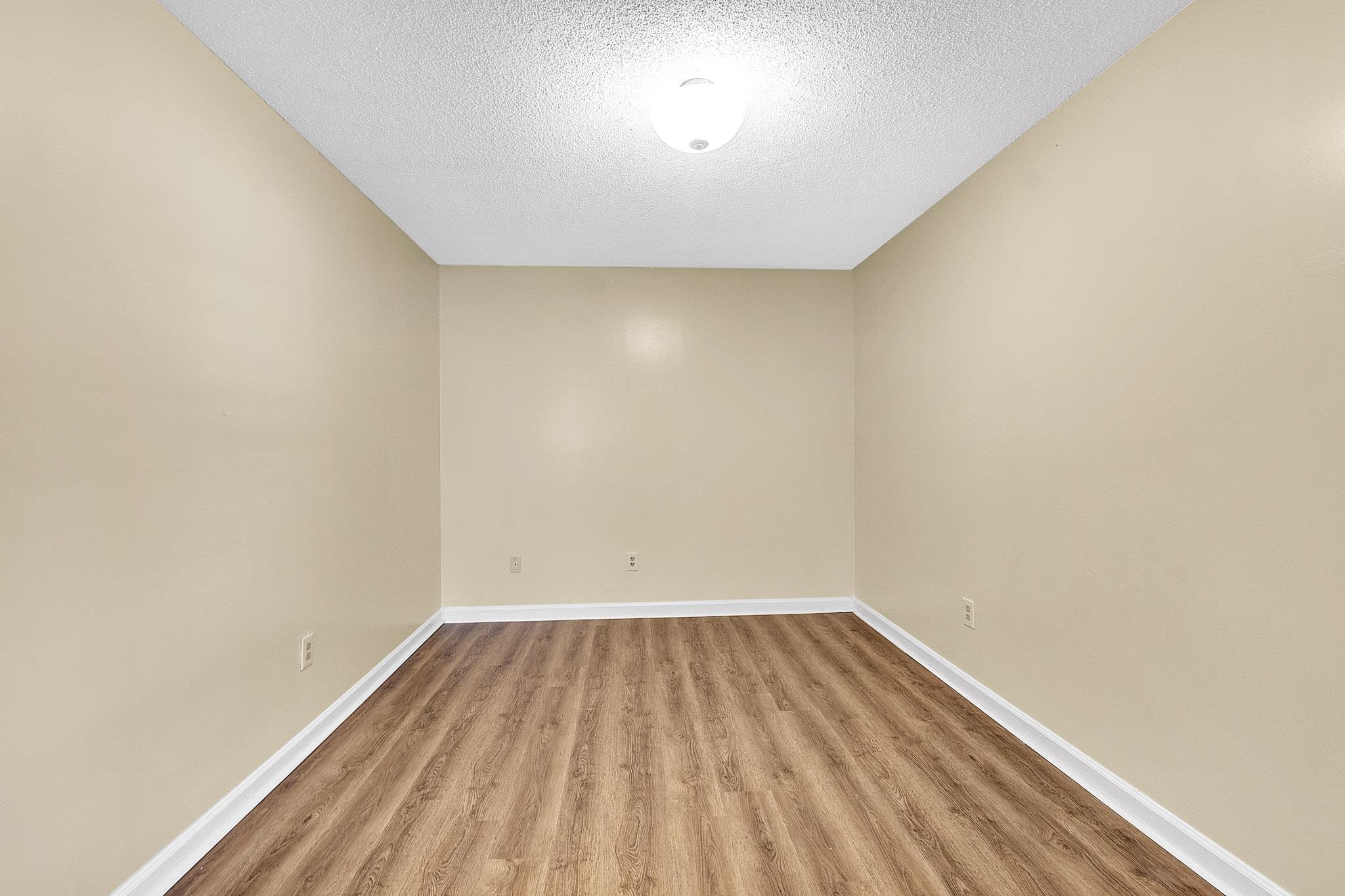 2955 Lake Park Road Memphis, TN 38127 - Photo 20 of 26 a view of room with a window and wooden floor