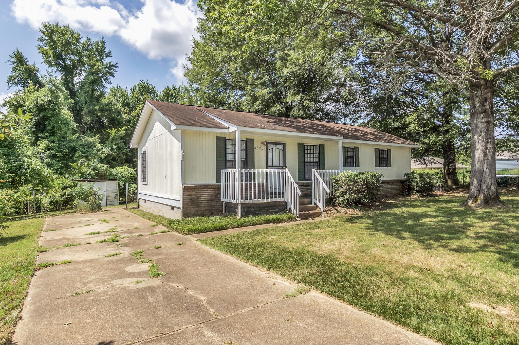 2955 Lake Park Road Memphis, TN 38127 - Photo 2 of 26 a view of a house with a yard