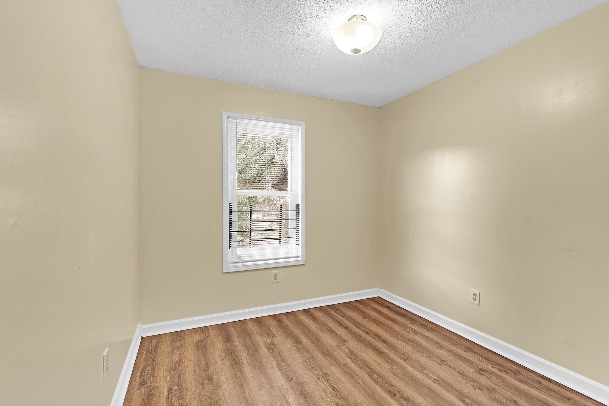 2955 Lake Park Road Memphis, TN 38127 - Photo 22 of 26 an empty room with a window