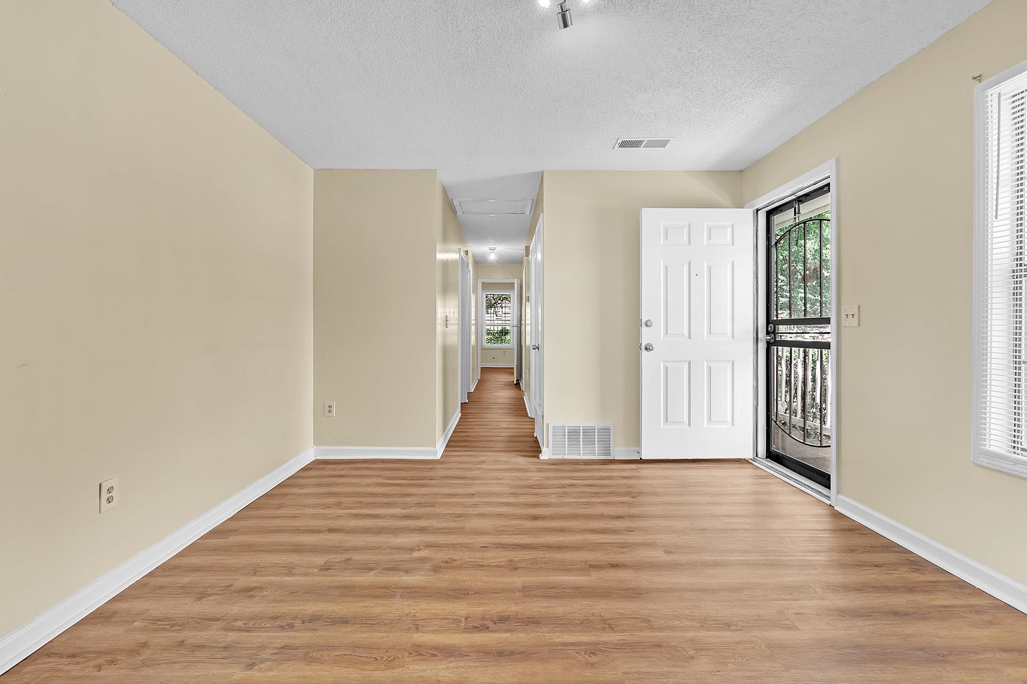 2955 Lake Park Road Memphis, TN 38127 - Photo 4 of 26 a view of empty room with wooden floor