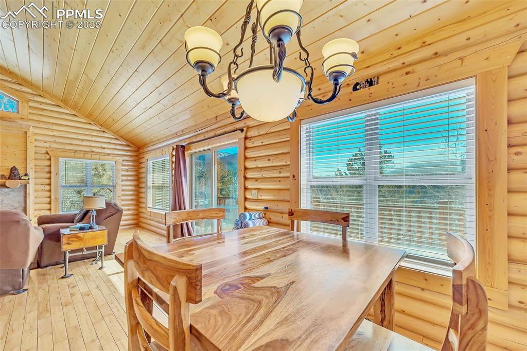17549 Highway 67 Divide, CO 80814 - Photo 12 of 46 a view of a patio with a table and chairs and couches