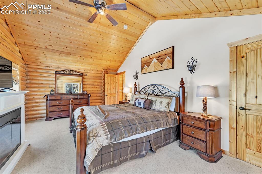 17549 Highway 67 Divide, CO 80814 - Photo 22 of 46 a bedroom with a bed and a cabinets