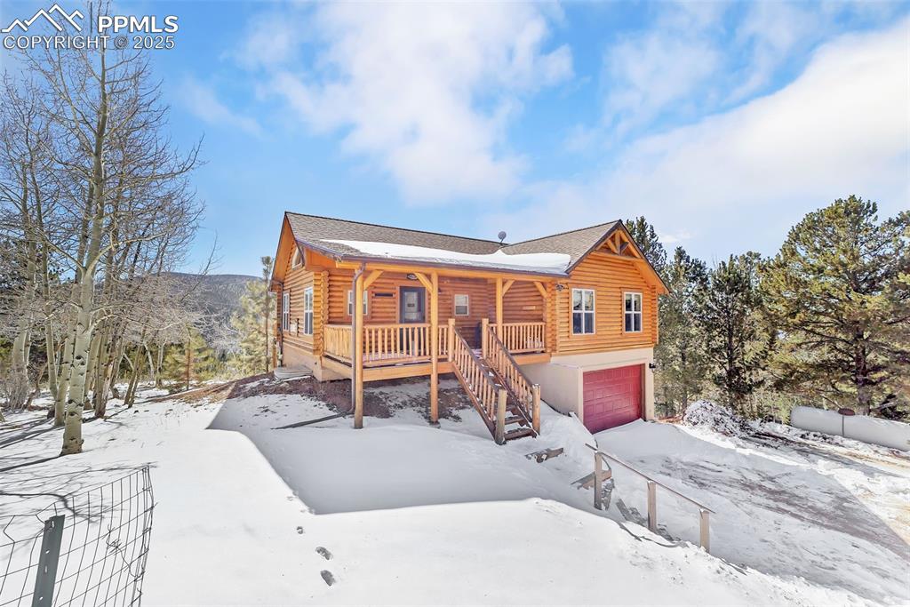 17549 Highway 67 Divide, CO 80814 - Photo 3 of 46 a front view of house with outdoor space