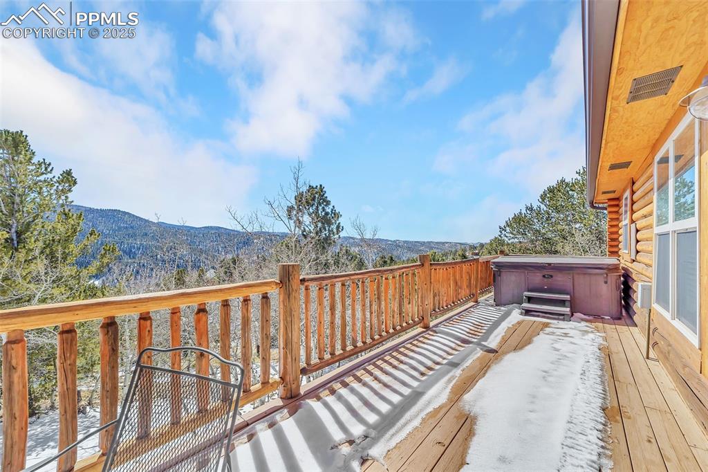 17549 Highway 67 Divide, CO 80814 - Photo 34 of 46 a balcony with wooden floor