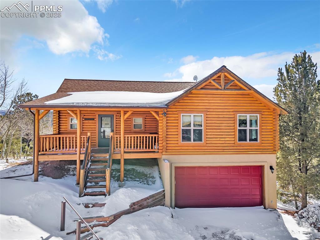 17549 Highway 67 Divide, CO 80814 - Photo 36 of 46 a front view of a house with a yard