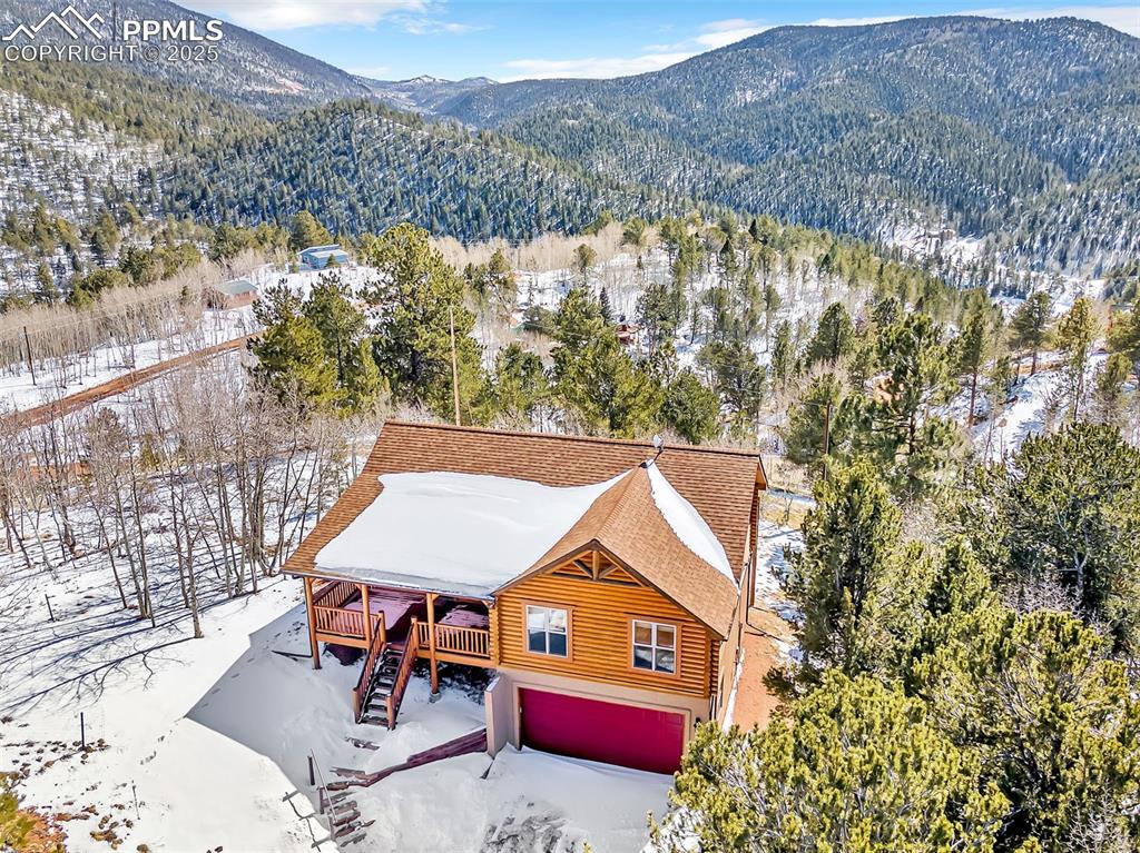17549 Highway 67 Divide, CO 80814 - Photo 39 of 46 an aerial view of houses with yard