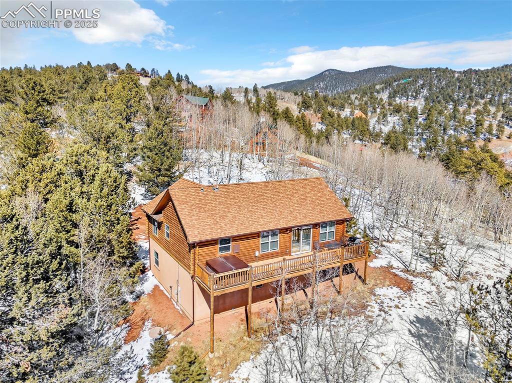 17549 Highway 67 Divide, CO 80814 - Photo 44 of 46 a view of a balcony with an outdoor space and seating area
