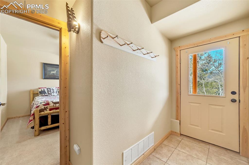 17549 Highway 67 Divide, CO 80814 - Photo 7 of 46 a view of a room with empty shelves