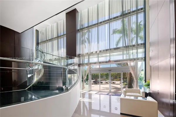 a view of entryway and kitchen