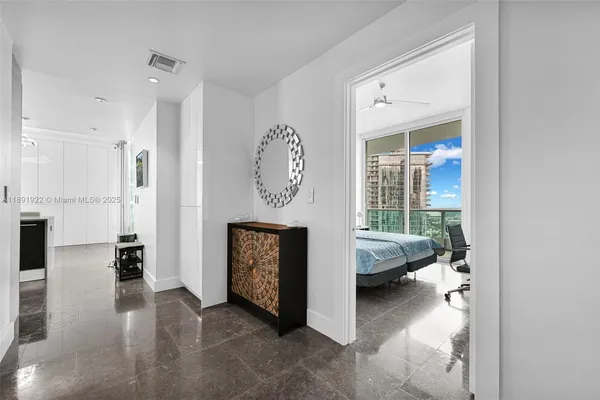 a view of a livingroom with furniture and a fireplace