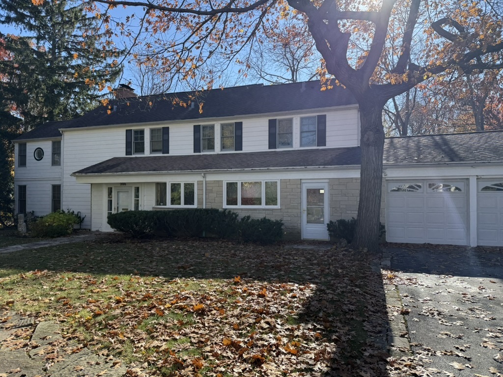 200 Braeburn Road Highland Park, IL 60035 - Photo 27 of 30 a front view of a house with a yard
