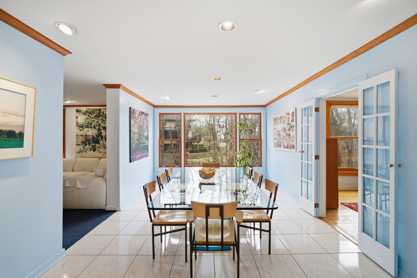 200 Braeburn Road Highland Park, IL 60035 - Photo 4 of 30 a view of a dining room with furniture large windows and wooden floor