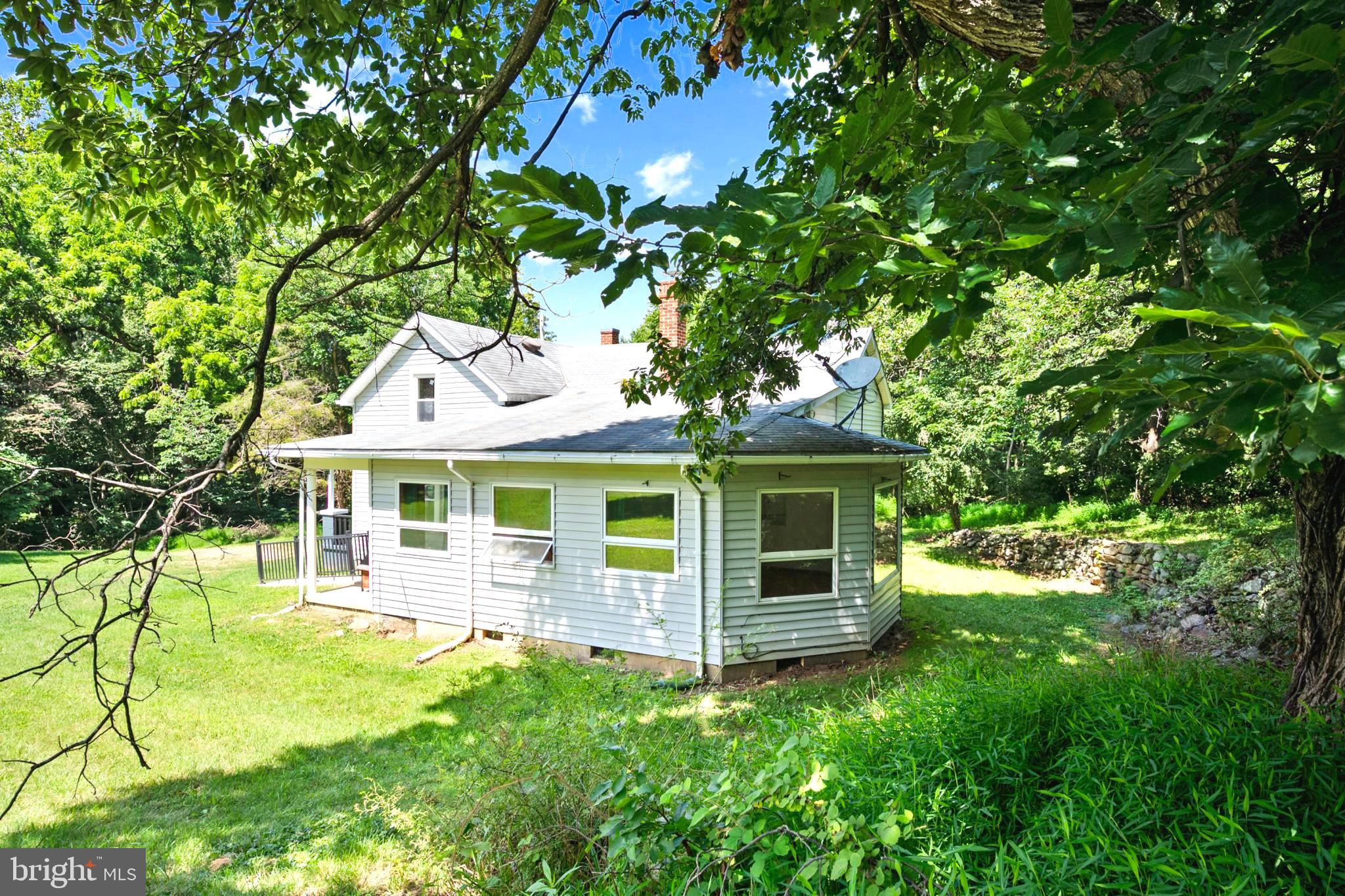 145 Weakley Lane Stanley, VA 22851 - Photo 22 of 27 a front view of a house with yard