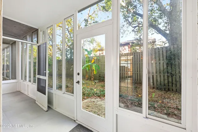 a view of a bathroom with a large window