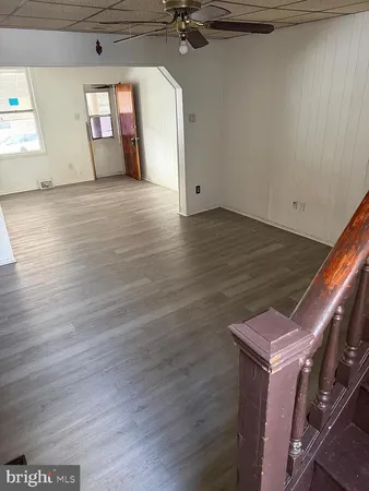 a view of a livingroom with wooden floor