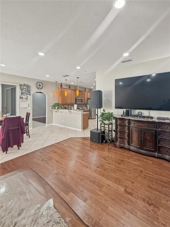 2056 Clapper Trail Apopka, FL 32703 - Photo 5 of 14 a room with furniture and a flat screen tv
