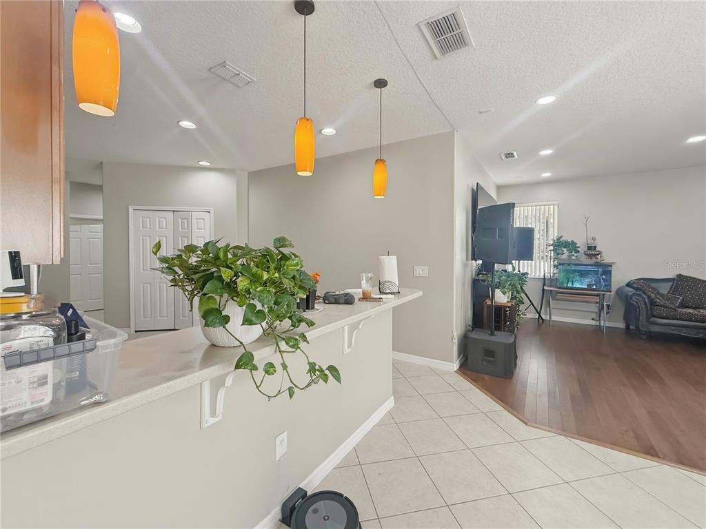 2056 Clapper Trail Apopka, FL 32703 - Photo 8 of 14 a view of kitchen and dining area with furniture