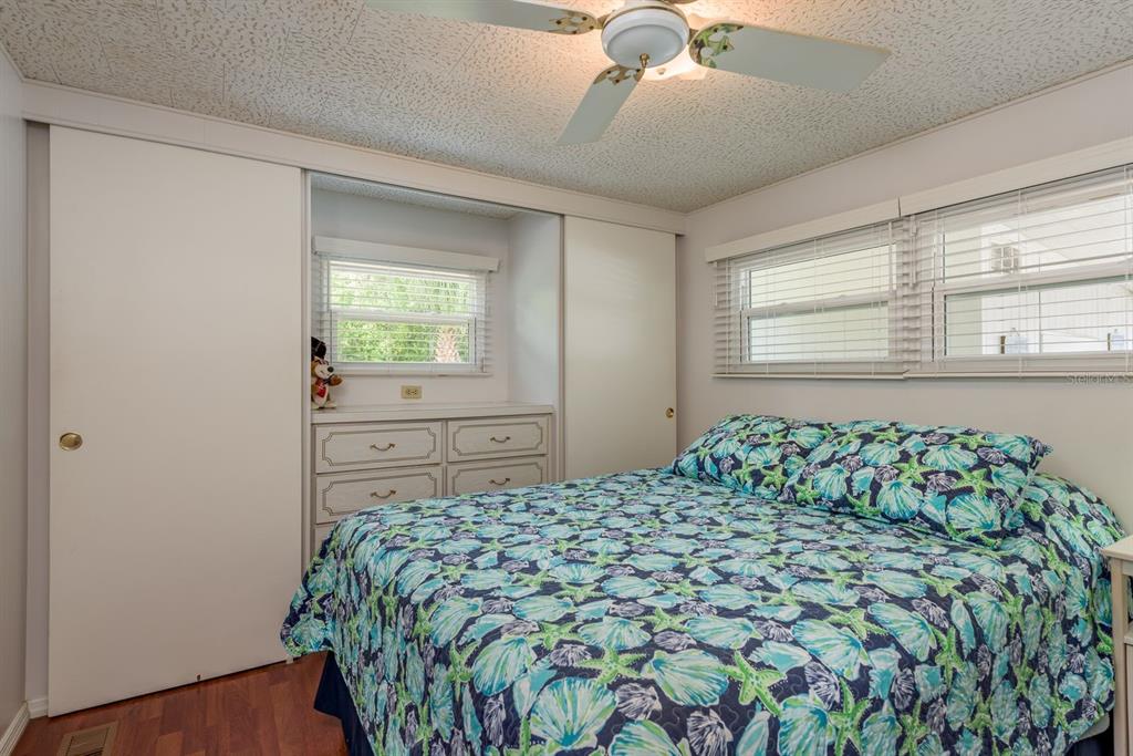 2331 Belleair Road, Unit 514 Clearwater, FL 33764 - Photo 16 of 39 a bedroom with a bed and a window