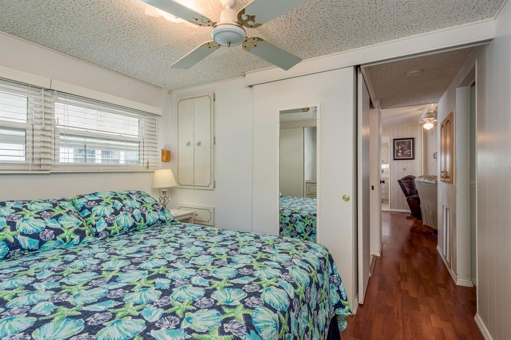 2331 Belleair Road, Unit 514 Clearwater, FL 33764 - Photo 17 of 39 a bedroom with a bed and a window