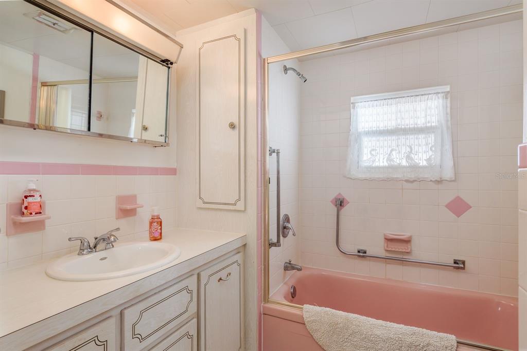 2331 Belleair Road, Unit 514 Clearwater, FL 33764 - Photo 18 of 39 a bathroom with a sink a toilet and shower
