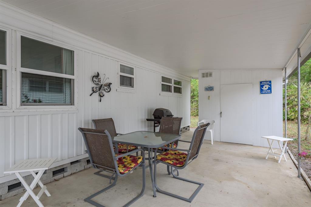 2331 Belleair Road, Unit 514 Clearwater, FL 33764 - Photo 23 of 39 a view of a dining room with furniture and window