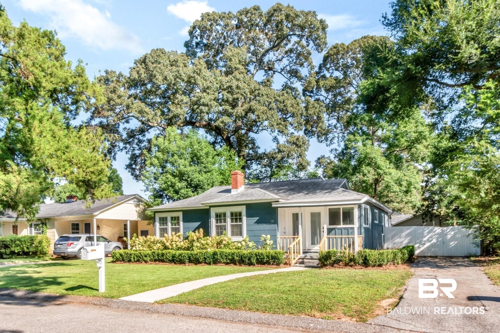 18 Princess Anne Road Mobile, AL 36608 - Photo 39 of 41 Bungalow featuring a front yard, a chimney, and a porch