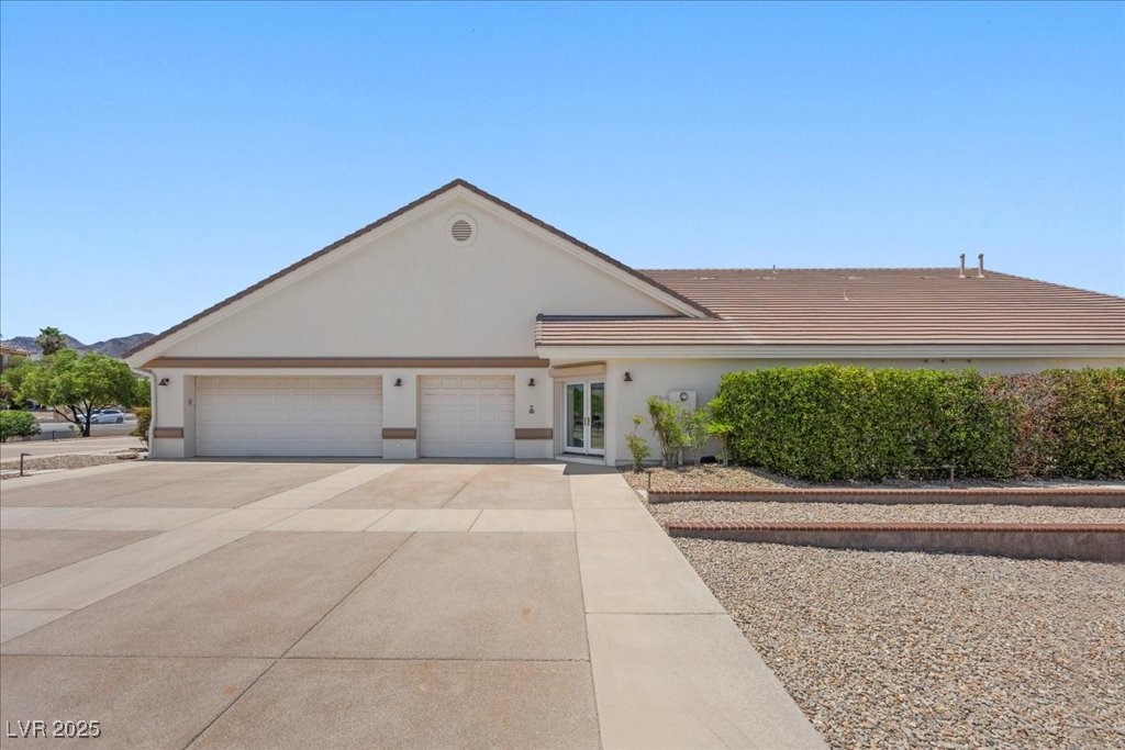 640 Quail Covey Road Henderson, NV 89002 - Photo 4 of 75 View of East driveway, 5 Car garage